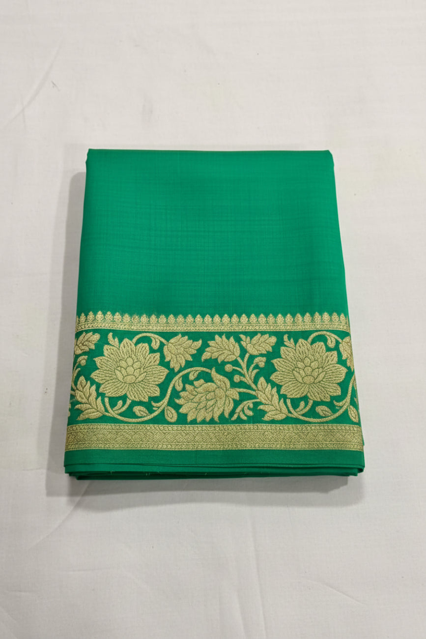 Green color with golden color floral woven tussar silk saree